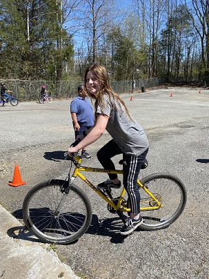 Elsie showing us her bike