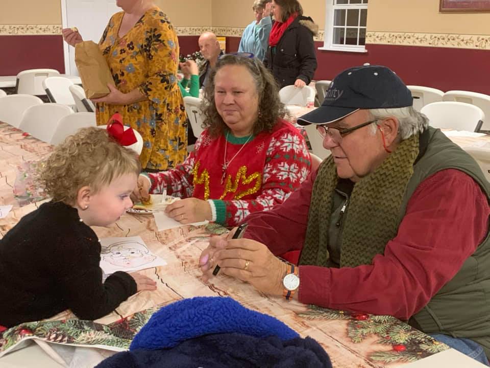 Family receiving their Stockings of Love