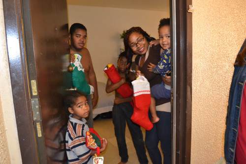 Family receiving their Stockings of Love