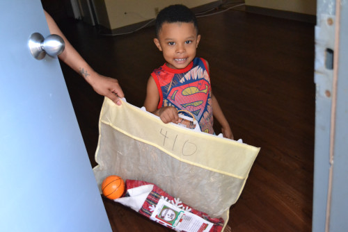 Little boy receiving his Stocking of Love